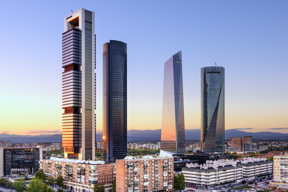 Madrid, Spain financial district skyline at dusk.